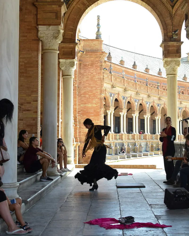 Flamenco dancer performing at Plaza de España in Seville